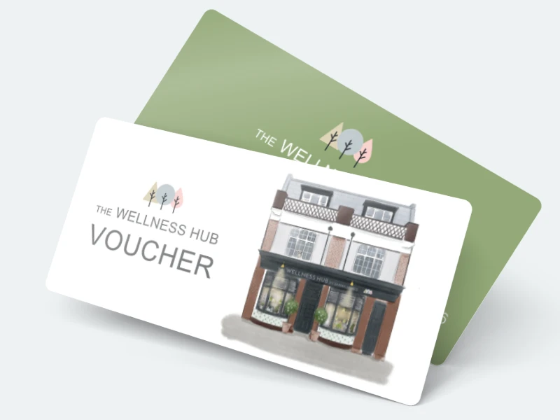 Two rectangular cards for The Wellness Hub are shown, one featuring an illustrated shopfront and the word VOUCHER, the other with the logo on a green background.